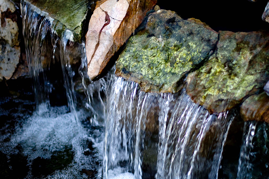 Custom paver patio installation with seating area