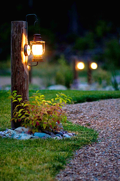 Natural stone retaining wall along a sloped property